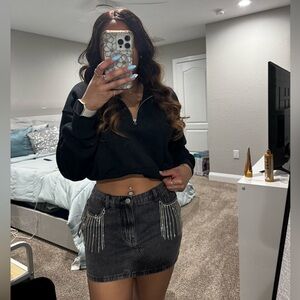 Charlotte Russe black denim rhinestone fringe accented mini skirt, size medium